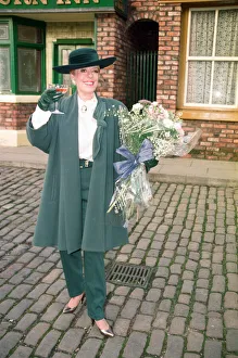 Julie Goodyear is pictured outside The Rovers Return on the set of Coronation Street