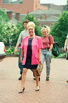 Julie Goodyear is pictured outside the set of Coronation Street greeting fans