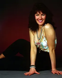 Julie Miller wearing vest top black trousers December 1989