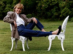 Julie Walters Actress and Commedienne Sitting on white garden chairs in garden