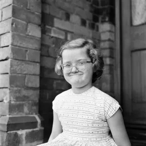 Junya Majkut, 8, of Derby-Road Derby pulls a funny face. June 1960 M4288-001