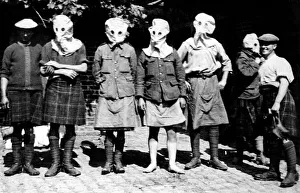 Gas Masks Prints: Just behind the British frontline. Men of the Scottish regiment get use to wearing their