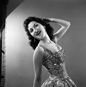 Just waiting for a break is 18-year- old singer Janice Peters who