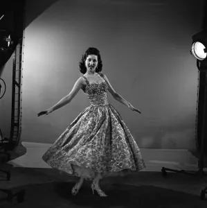 01222 Prints: Just waiting for a break is 18-year- old singer Janice Peters who