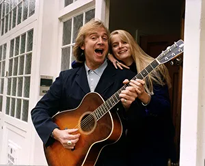 Musicians Prints: Justin Hayward lead singer of the moody blues plays guitar with his daughter Doremi