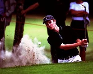 Bunker Prints: Justin Rose plays out of a greenside bunker on the 15th hole during the Dutch Open Golf