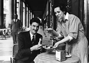 Serving Prints: Juventus footballer Ian Rush eating breakfast al fresco on the Via Roma in Turin, Italy