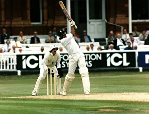 Kapil Dev who plays cricket for India lashes one of the world record four successive