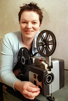 Karen David Belle and Sebastian February 1999 Member of group with cine projector