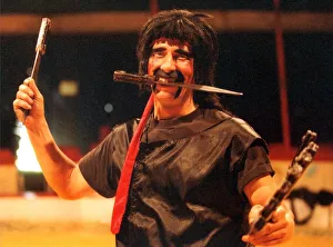 00074 Prints: karl Orry of the Russian State Circus getting in some practice with his knives