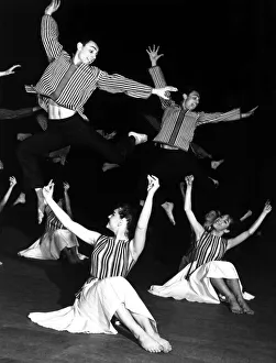 The Karmon Israeli dancers rehearsing - six boys and six girls dancing barefoot in highly