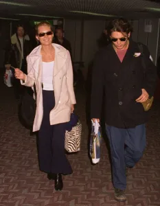 Kate Moss Model arrives at Heathrow Airport with her boyfriend Johnny Depp Actor
