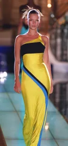 Supermodel Prints: Kate Moss models Versace at Paris fashion show on catwalk wearing yellow black