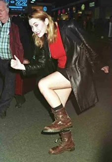 Leather Coat Prints: Kate Winslet star of the blockbuster film Titanic leaving Heathrow for New York