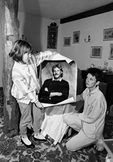 Painting Prints: Kathy Botham and daughter Sarah holding picture of Ian Botham - October 1987