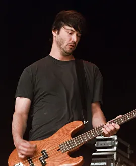 Hollywood Prints: Keanu Reeves on stage June 1999 performing at the Glastonbury Festival with his
