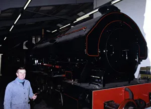 00403 Prints: Keith McNulty, Hon. Treasurer with a Bagnall 0-6-0 locomotive built in 1950 at the George