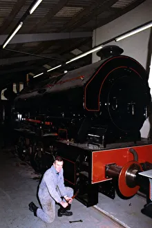 00403 Prints: Keith McNulty, Hon. Treasurer with a Bagnall 0-6-0 locomotive built in 1950 at the George