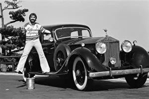 Keith Moon, drummer of The Who rock group and with his 1929 built Rolls Royce Phantom car
