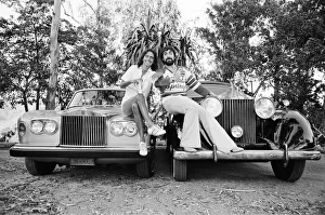 Drums Prints: Keith Moon, drummer of The Who rock group and American rock star Alice Cooper pose with