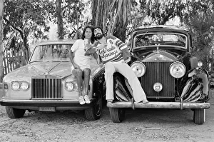Keith Moon, drummer of The Who rock group and American rock star Alice Cooper pose with