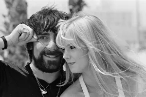 Keith Moon, drummer of The Who rock group with model Annette Lax in the resort of Malibu