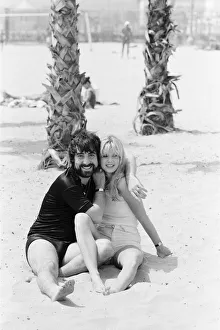 Keith Moon, drummer of The Who rock group with model Annette Lax in the resort of Malibu