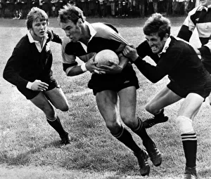 Keith Poole, of Newport RFC, trying to break the grip of rival flanker Wilson Lauder of