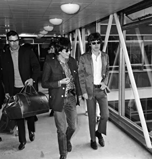 Caucasian Prints: Keith Richards & Mick Jagger of The Rolling Stones at London Airport on 23 June 1966 en