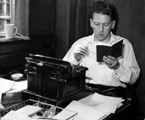 Reading And Writing Prints: Keith Waterhouse Daily Mirror columnist July 1957 Sitting at typewriter reading