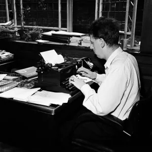 Keith Waterhouse Daily Mirror Newspaper Columnist, pictured at his desk July 1957
