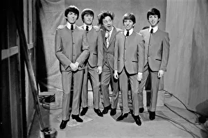 00893 Prints: Ken Dodd (centre) posing with Madame Tussauds figures of The Beatles