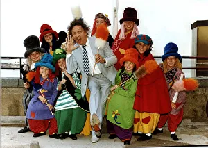 Ken Dodd comedian stands with diddy men and tickling sticks Dbase A©Mirrorpix