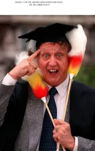 Ken Dodd comedian waring mortar board hat Ken Dodd after being made an honorary fellow