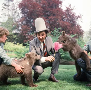 Bear Prints: Ken Dodd visits Diddy and Doddy, two four-month-old bears at Flamingo Park Zoo