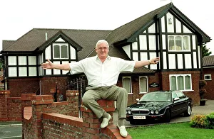 Ken White lottery winner pictured next to his new house and car won 6 million