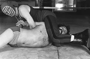 Wrestler Prints: Kendo Nagasaki wrestler - real name Peter Thornley - demonstrates some wrestling holds
