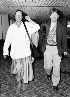 Kenneth Branagh Actor and actress wife Emma Thompson arrive at Heathrow Airport after