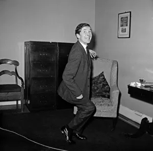 00895 Prints: Kenneth Williams pictured in his agents office in Cork Street, London