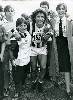Strips Prints: Kevin Keegan being helped by Red Cross girls in the Great North Run 1981