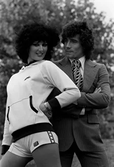 Kevin Keegan models a suit and the latest 1970s fashion with model wearing hotpants
