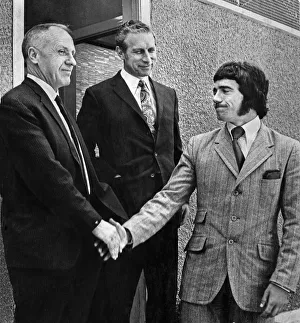 Transfer Prints: Kevin Keegan signs for Liverpool. Here he is pictured shaking hands with his new
