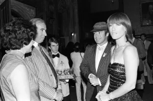 Musicians Prints: Kiki Dee and Elton John attend a House of Commons reception