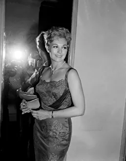 00876 Prints: Kim Novak attends the premiere of the Middle of the Night. June 1959
