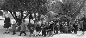 00082 Prints: Kindergarten teachers lead their young charges though a Yalta park in the USSR