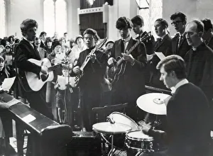 Musicians Prints: The King Bees pop group provides a modern tempo accompaniment for the hymns at a