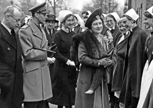 00105 Prints: King George VI and Queen Elizabeth with staff from Coventry and Warwickshire Hospital
