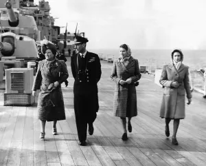 King George VI and Queen (now Queen Mother) on the deck of HMS Vanguard with their