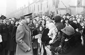 King George VI tours the bomb shattered areas of Birmingham following the city suffering
