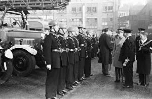 King George VI tours the bomb shattered areas of Birmingham following the city suffering